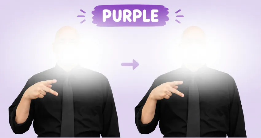 Man in a black shirt and tie demonstrates the ASL sign for purple with a P handshape held at his chest.