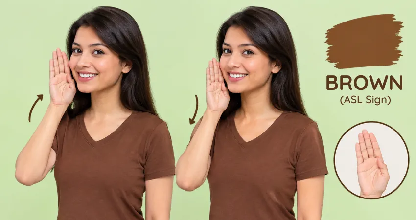 Smiling woman in a brown shirt shows the ASL sign for the color brown, sliding her open hand down her cheek.