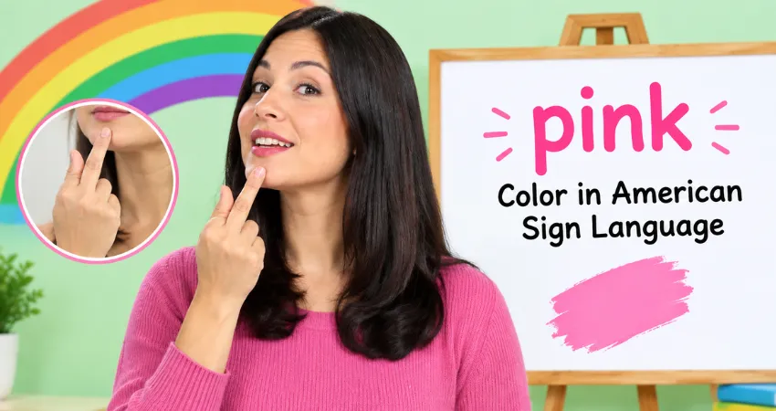 Woman in a pink sweater touches her lip with a finger to show the ASL sign for the color pink, with a close-up inset.