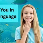 Young girl showing Thank You sign language gesture ASL hand sign near lips for kids learning